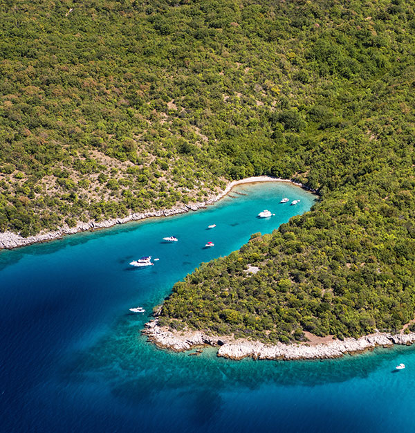 boats in clear sea