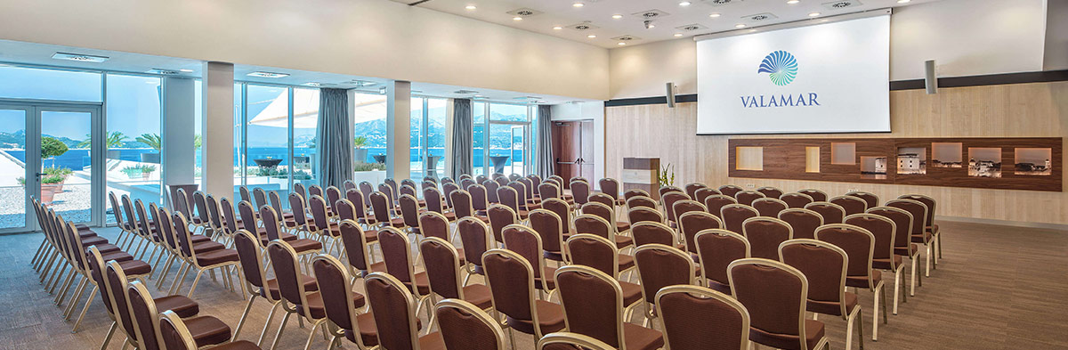 a room with rows of chairs