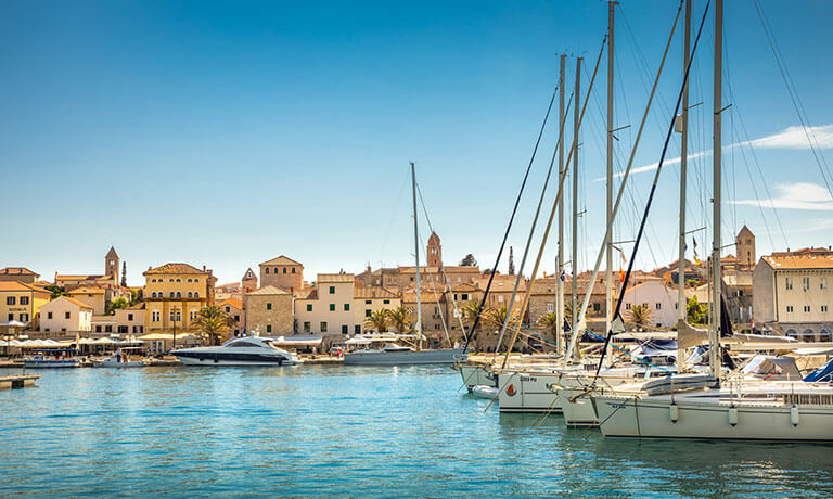 a group of boats in a harbor