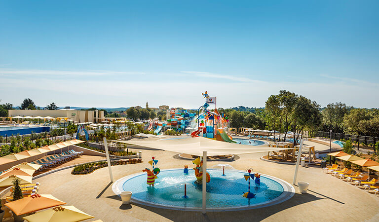 a swimming pool with a slide