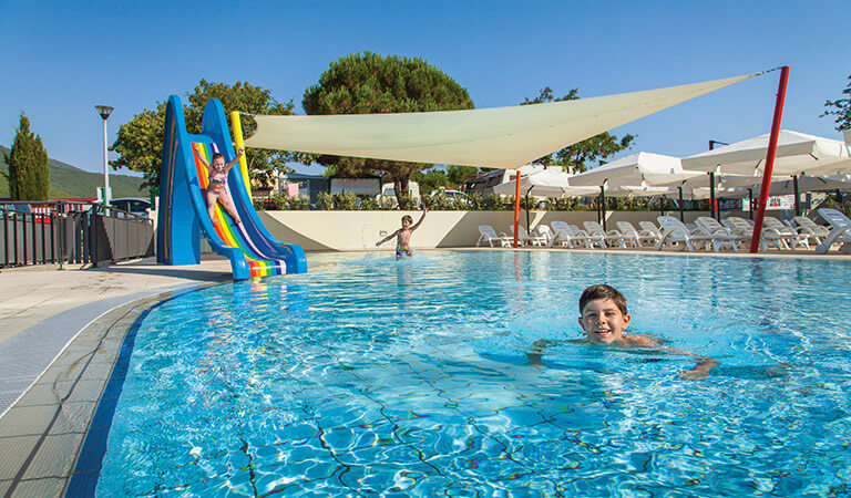 a boy in a pool